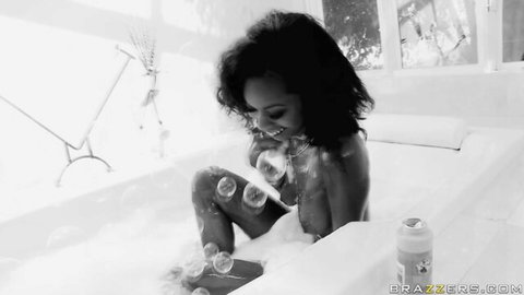 Hydie Waters in steamy bubble bath, teasing her curvy ebony body