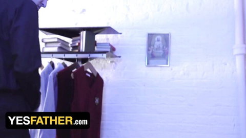 Suited gay daddy stands in closet with saint icon in YesFather taboo roleplay scene