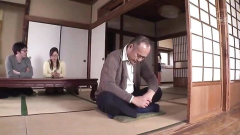 Japanese young woman with glasses sits with husband and older DILF men in traditional tatami room