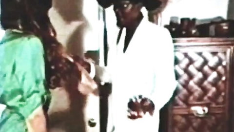 Classic busty redhead in green dress with Black man in white suit vintage interracial scene