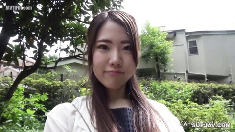 Slender Asian Yuzuki in white blouse teases outdoors