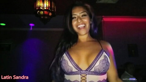Latisandra in purple lace lingerie, busty Latina smiling seductively
