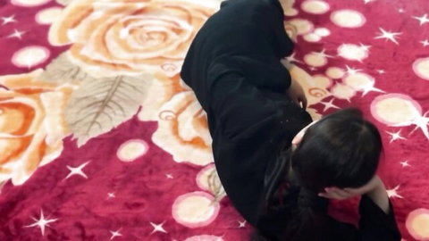 Hot Indian college girl in black abaya lying on rug