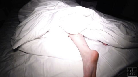 Stepsister's bare leg peeking from white sheets on bed, teasing post-sex hideaway