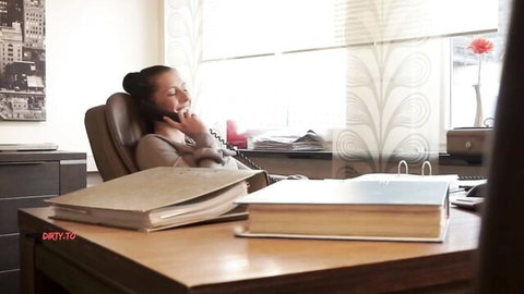 Texas Patti as dirty-talking office MILF on phone, seductive smile