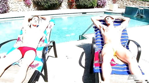 Tyler Torro and Dominic Reed lounging poolside in speedos, athletic bodies
