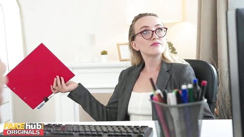 Blonde office woman in glasses holding red folder seductively at desk