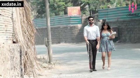 Indian bhabhi in short floral dress walks with dev er outdoors teasing fun