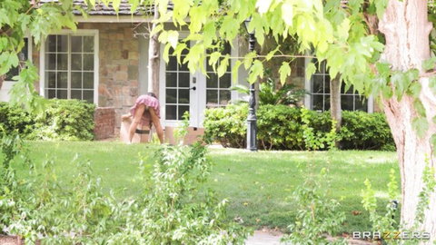 Busty woman bent over doggy style outdoors exposing bubble butt and shaved pussy