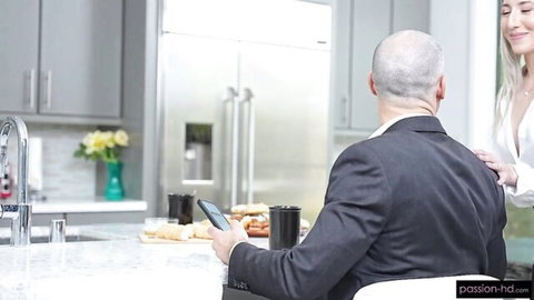 Blonde babe in tight white dress teases suited bald man in steamy kitchen morning seduction