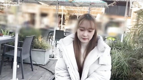 Fair-skinned slender Asian beauty in white jacket POV tease