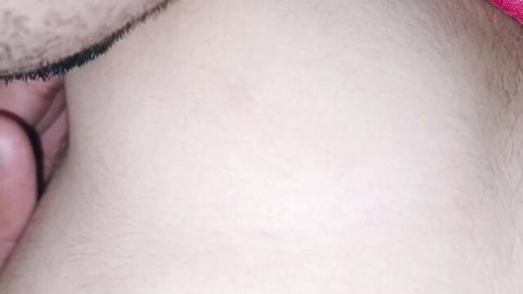 Bearded man's hand gripping pale smooth skin closeup in intimate moment
