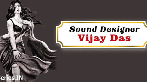 Seductive South Asian woman in flowing black saree posing provocatively with credits