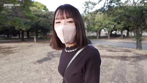Japanese F-cup receptionist in mask and sweater teases outdoors
