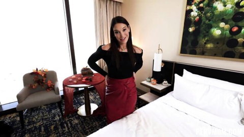 Katrina Colt busty brunette posing in sexy black top and red skirt