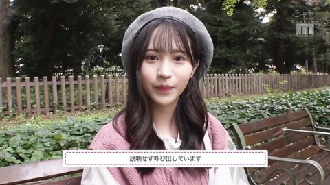 Cute Asian babe in pink sweater and beret smiling on park bench tease