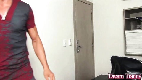 Nathalia De Castro in sexy red top, muscular trans beauty posing seductively