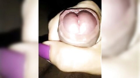 Close-up of spread wet pussy by hand with purple nails, purple toy nearby in shemale hooker scene