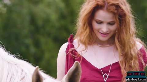 Heidi Romanova in red dress, redhead curves outdoors solo for Playboy