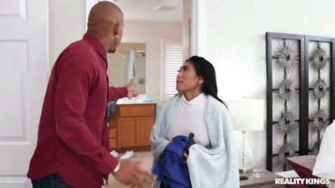 Ebony babe wrapped in towel confronted by muscular black stud in bathroom
