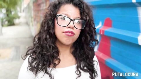 Curvy brunette Laura pouts with glasses in seductive adult thumbnail