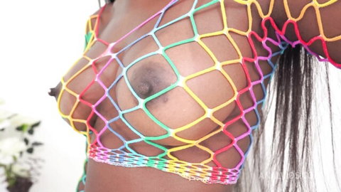 Jenny Pretinha ebony beauty in rainbow mesh top exposing dark nipples