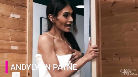 Tanned brunette babe Andy Lynn Payne teasing towel-clad in steamy sauna