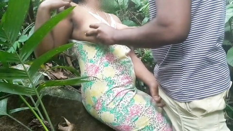 Hot Desi Tamil woman in floral dress groped outdoors in jungle sex scene