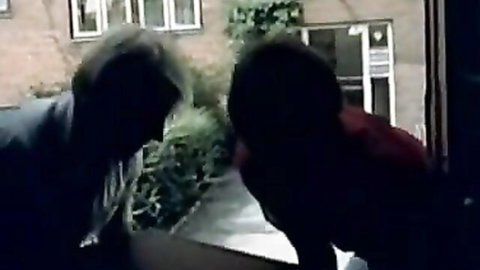 Two shadowy men approach in classic XXX maid seduction scene