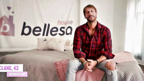 Ryan McLane in Bellesa House casual interview pose on bed