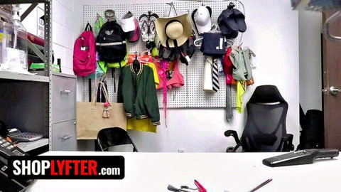 ShopLyfter backroom setup with hanging clothes for college girl caught shoplifting scene