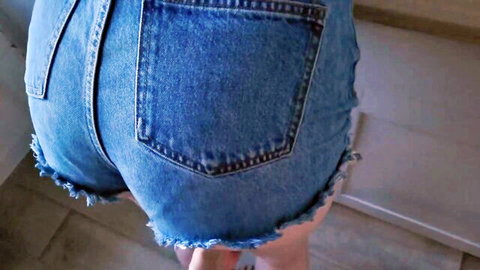 Stepsis in tight frayed denim shorts bending over, teasing strip tease