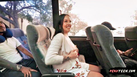 Madalina Moon smiles in floral skirt on bus with Kai Jaxon nearby