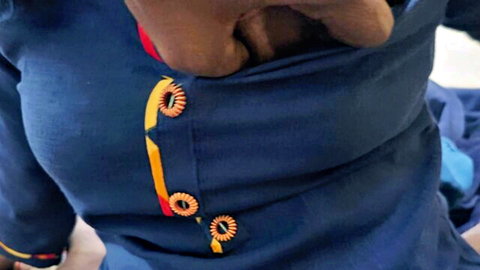 Tamil Indian aunt exposing curvy breasts in blue embroidered top, steamy tease