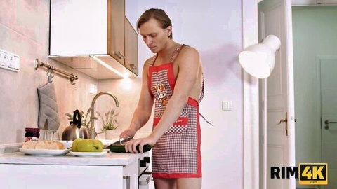 Muscular man in red apron teasing in kitchen, Kate Rich rim4k scene