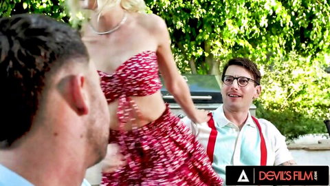 Blonde bombshell Kenna James in red polka-dot dress seducing man
