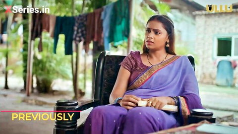 Sexy Desi woman in purple sari sitting thoughtfully, sizzling Indian diva vibe
