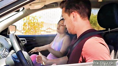 Petite Asian babe gropes driver's hard cock bulge through pants in car pickup