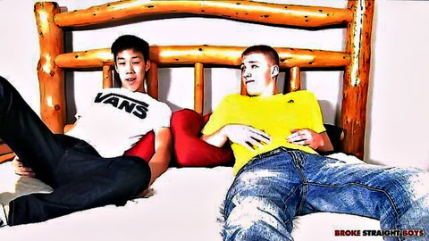 Two young broke straight boys playfully posing clothed on bed smiling seductively