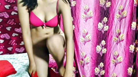 Neha Sharma in pink bra, seductive Desi pose with curves