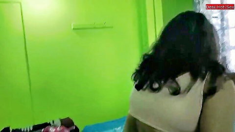 Beautiful Desi Bhabhi in white tank top, long black hair, teasing from behind