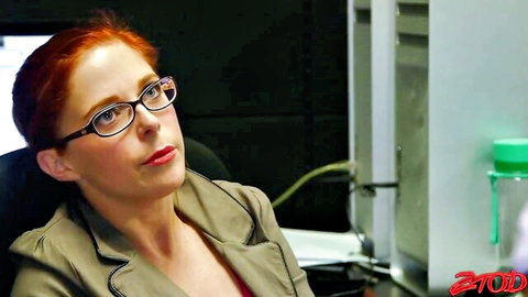 Penny Pax redhead with glasses in seductive pose for anal hardcore scene