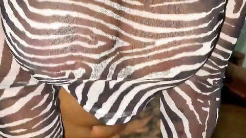 Busty Latina squeezing her massive tits in sheer zebra print top exposing hard nipples