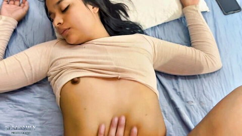 Latina brunette teen lying topless on bed exposing small perky tits hand on stomach