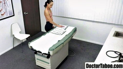 Alexis Tae in doctor's office, standing by exam table for intimate checkup