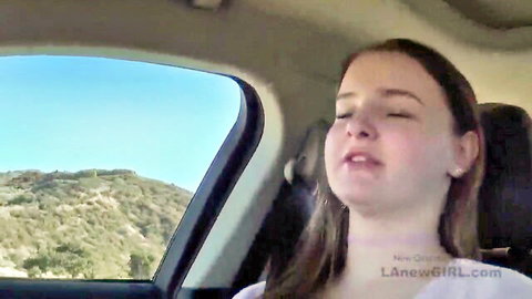 Young blonde in car audition, eyes closed in ecstasy, huge natural tits tease