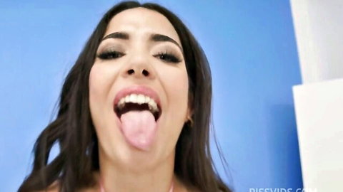 Nuria Millan teases with tongue out in close-up from BBC gangbang pee shower video