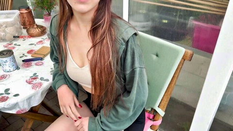 Luna Lou teases with big tits in white tank top and green hoodie