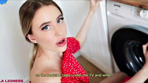 Young Russian blonde in sexy red off-shoulder top surprised near open washing machine POV
