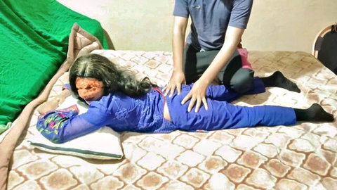 Indian man gropes and spreads petite South Asian woman's bare brown ass on bed